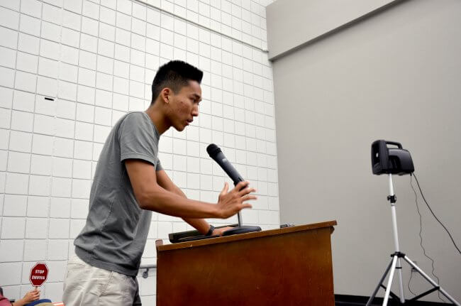 Joe delivers a public comment at the podium at Enviva Sampson public hearing