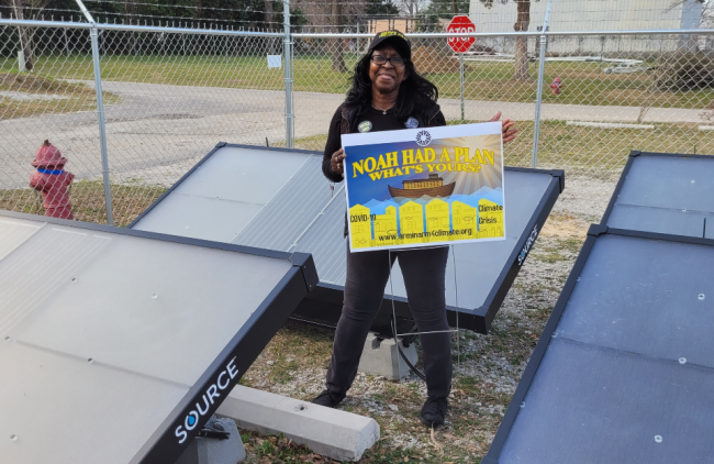 Loretta Slater with solar panels